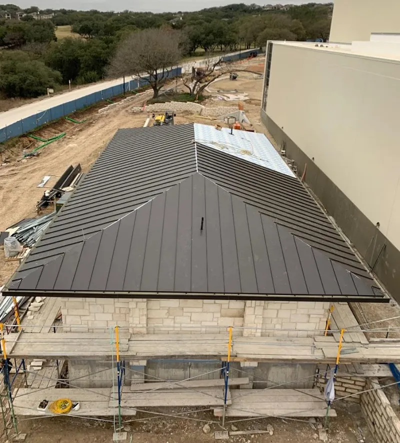 Metal roof new construction with scaffolding in Fountainebleau